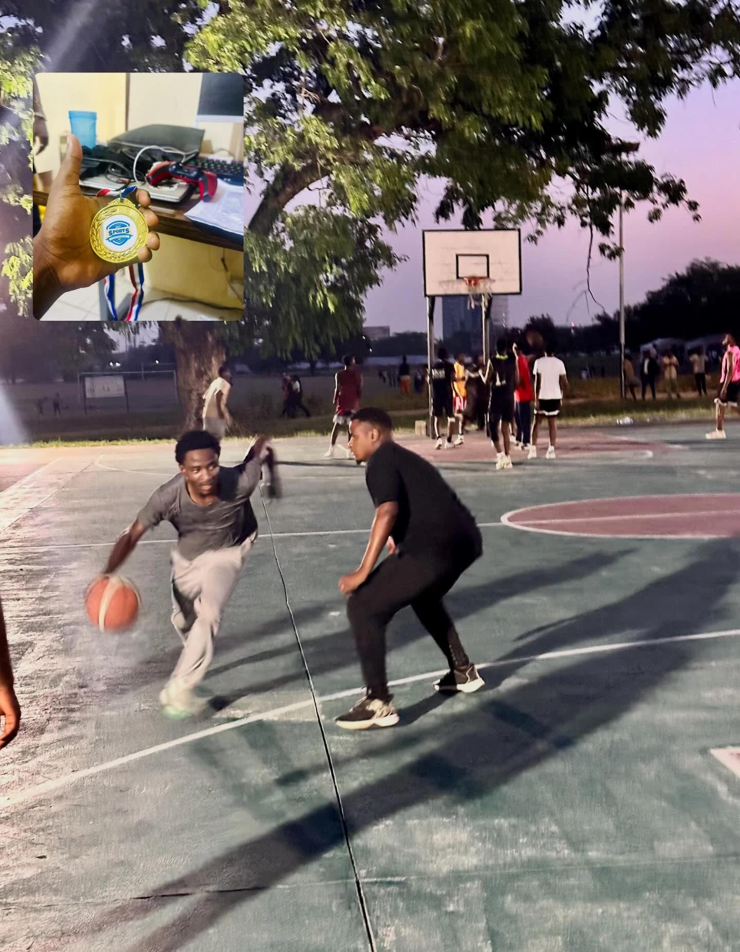 An outdoor basketball game at dusk, from Francis's January photo collection